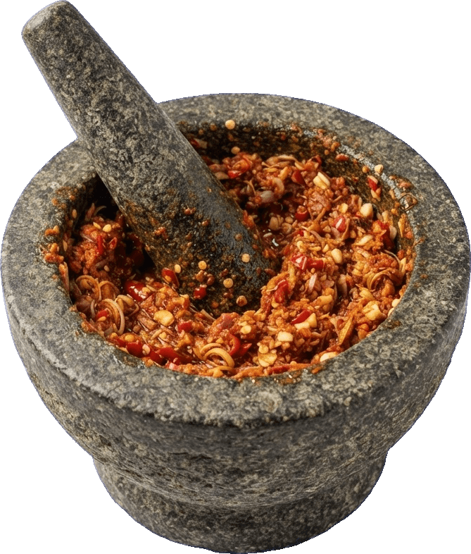 Stone mortar filled with freshly pounded Thai curry paste