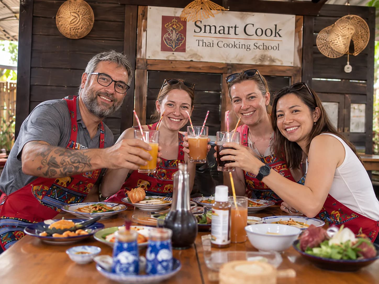 Guests enjoying a hands-on Thai cooking class